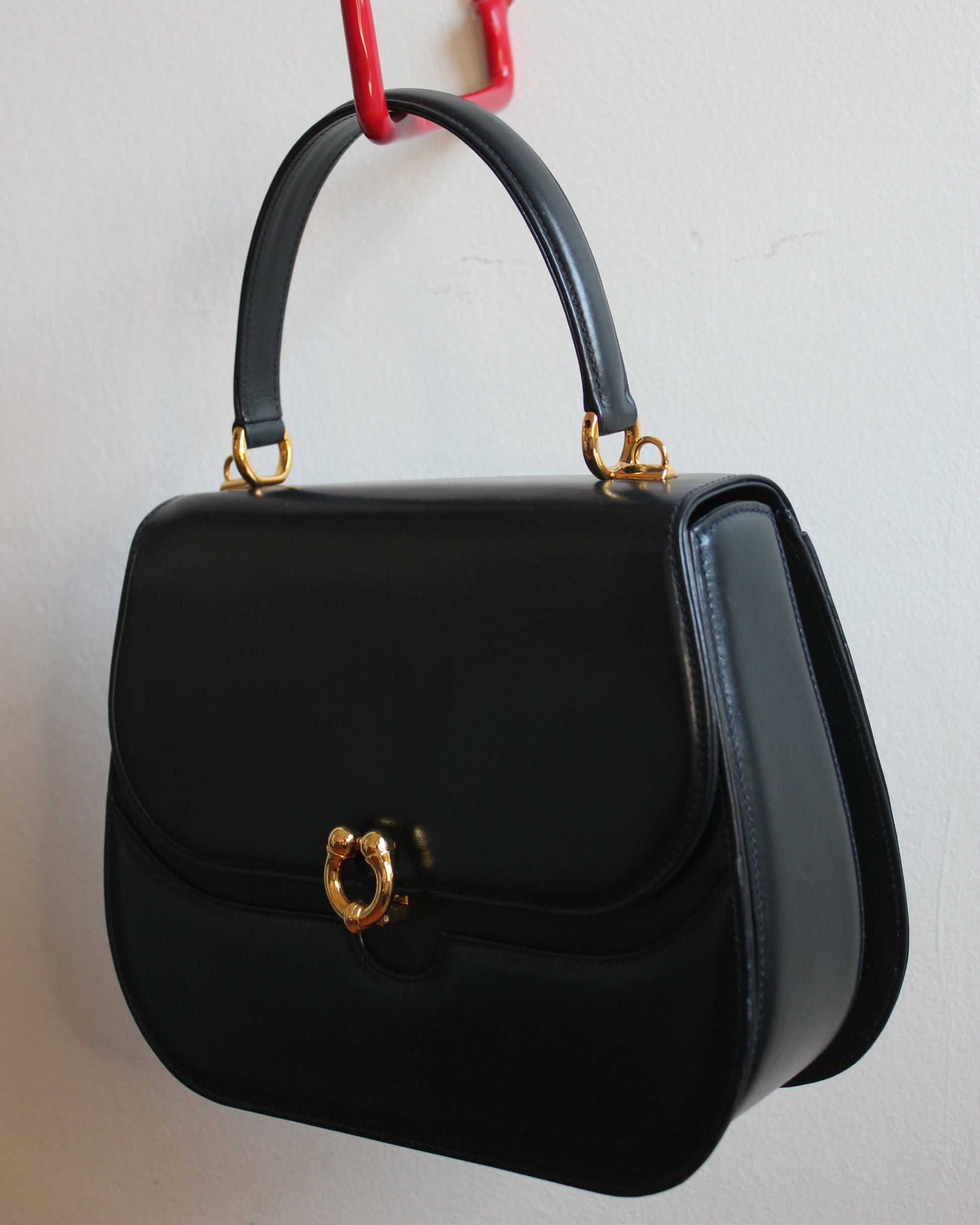 vintage navy gucci calfskin handbag with gold hardware