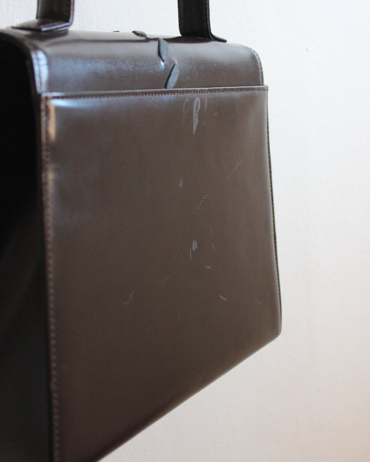 Scuffs on back of vintage YSL handbag