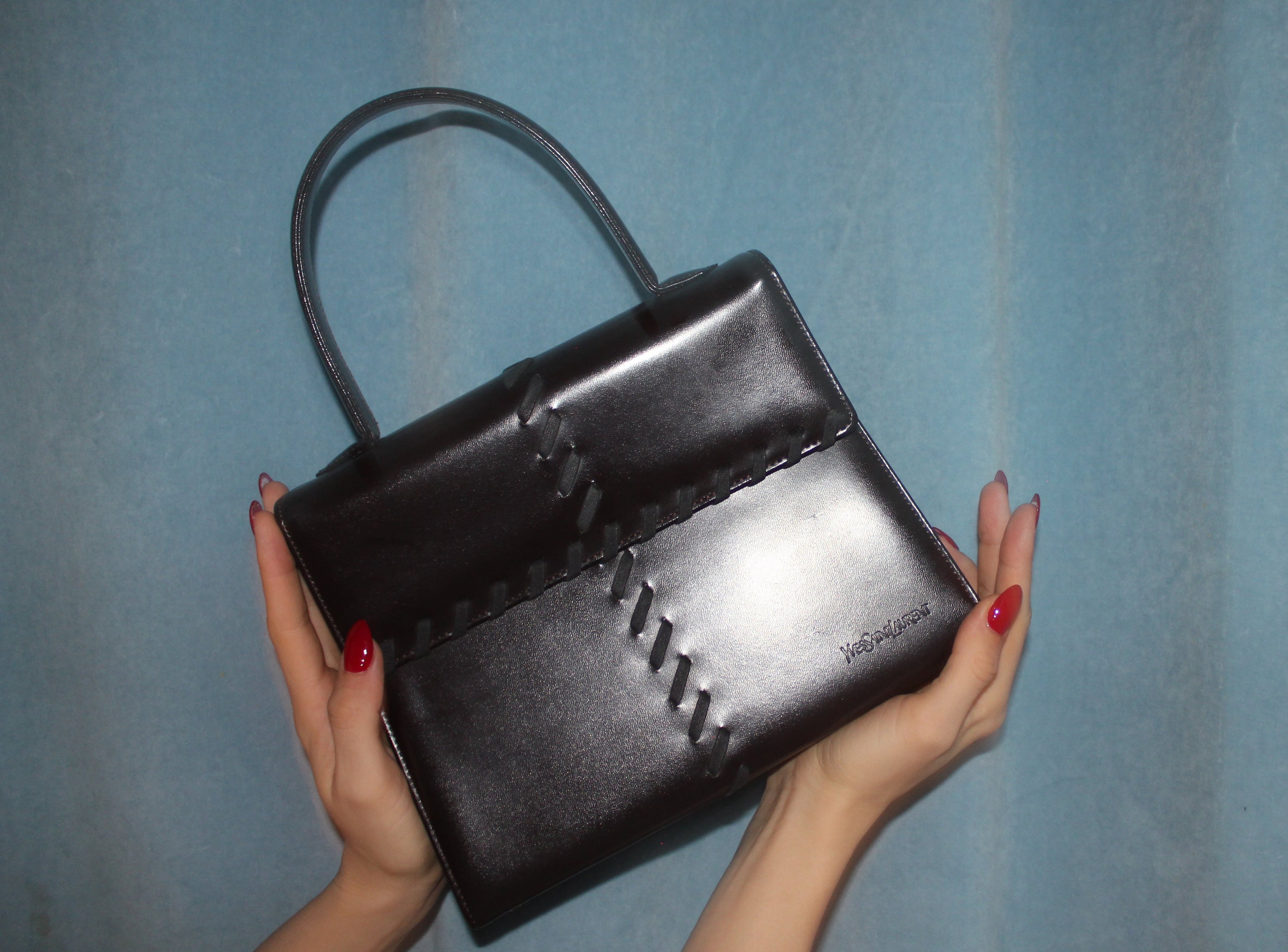 chocolate brown ysl bag with stitching details